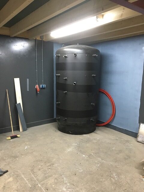 Installatie hout gestookte CV ketel